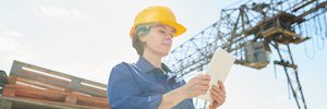 female Worker Using Tablet in Sunlight